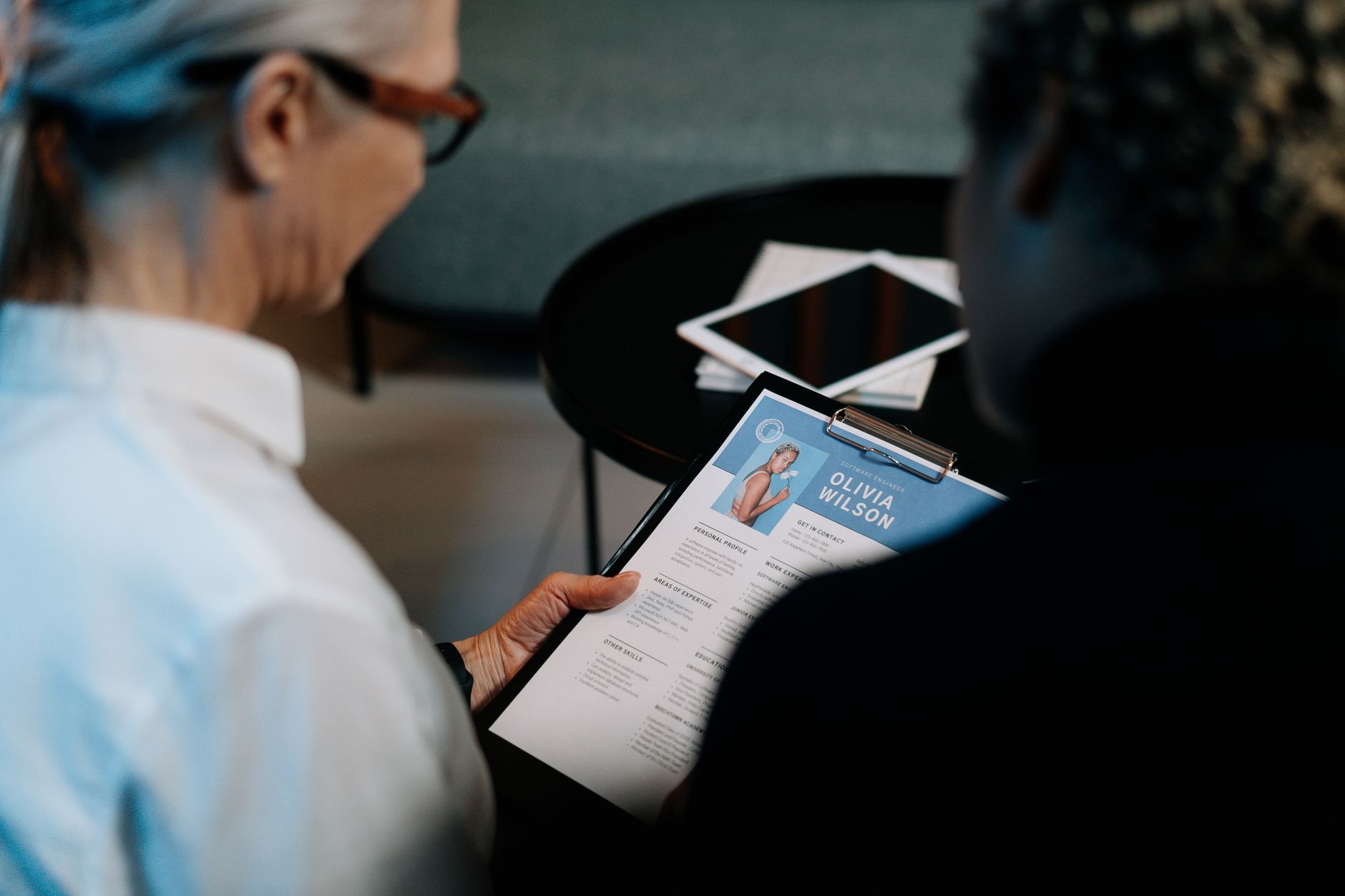 HR manager running a soft background check for employment on a candidate resume